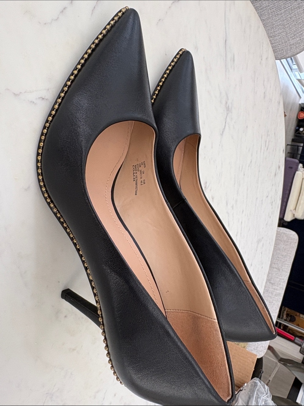 Coach Black Leather Pointed-Toe Heels with Gold Trim